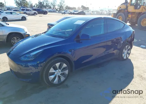 2023 Tesla Model Y Awd/Long Range Dual Motor All-Wheel Drive z USA, uszkodzony, nr VIN 7SAYGDEE3PF596164